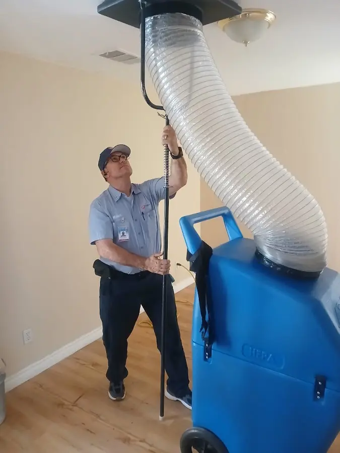 Mini Split Installation technician using HEPA equipment in Fresno